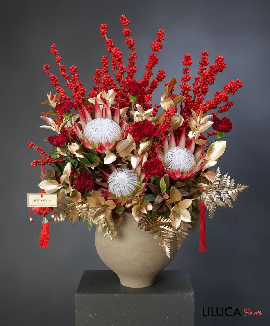 Bình Protea mix đào đông đỏ Royal Fortune